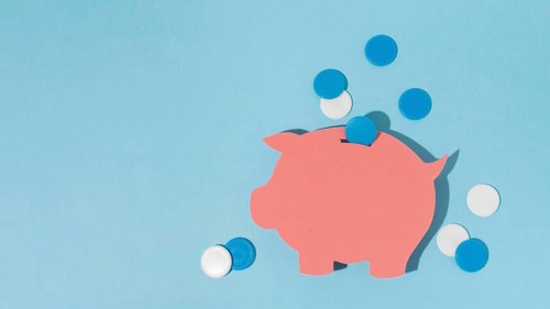 Top view piggy bank blue background