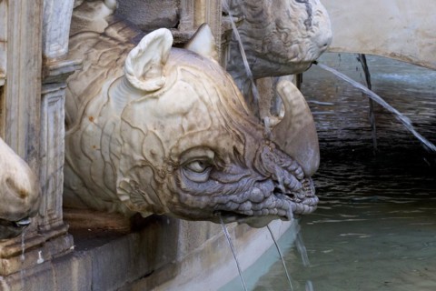 Marble head of a mythological animal