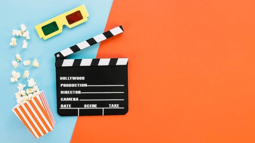 Clapperboard with 3d glasses popcorn