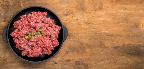 Top view meat with herbs copy space