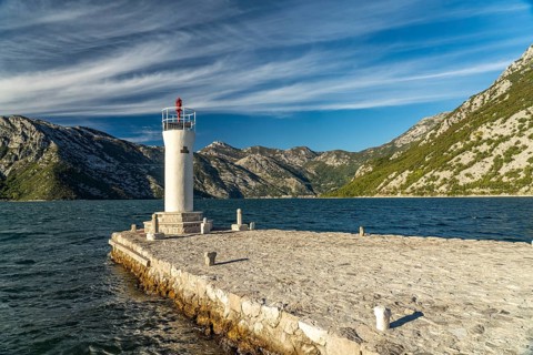 Lighthouse on the artificial island of Gospa od Skrpjela near Perast on the Bay of Kotor