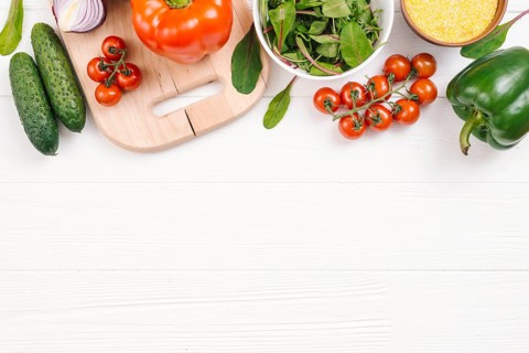 Elevated view fresh vegetables white wooden desk