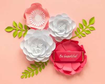 Flat lay paper flower arrangement women s day