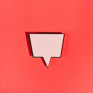 Vintage blank pink speech bubble red background