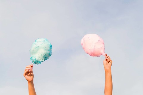 Hands holding cotton candy