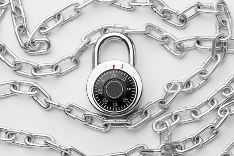Flat lay metal chain with lock