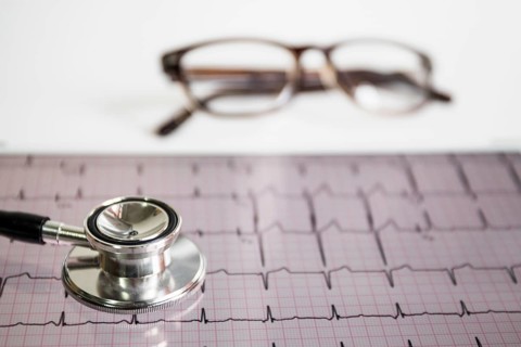 Stethoscope cardiogram with eyeglasses