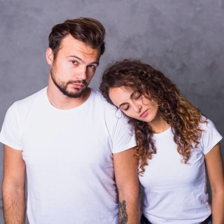 Woman holding head man shoulder
