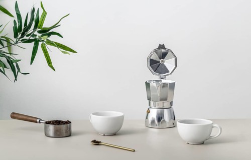 Front view table with coffee cup kettle