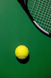 Top view tennis ball with racket