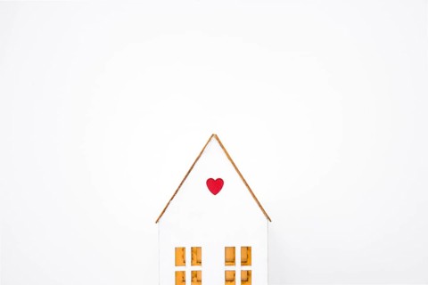 Toy house with small heart