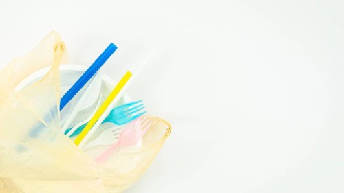Various colorful plastic disposable tableware