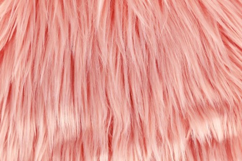 Close up of long pink synthetic fake fur