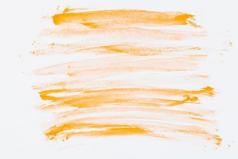 Orange hand drawn watercolor brush stroke