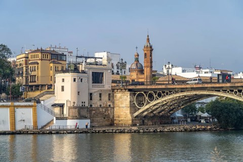 Puente de Isabel II Bridge over the Guadalquivir River and the Capilla Virgen del Carmen