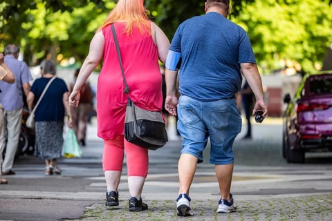 Man and woman with overweight