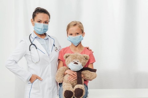 Medium shot doctor kid bear