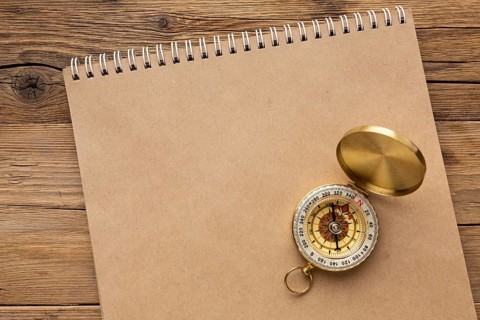 Top view compass notebook