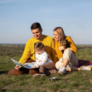 Family with child dog