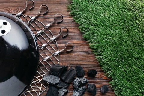 Grill grates with metallic skewer coal wooden textured