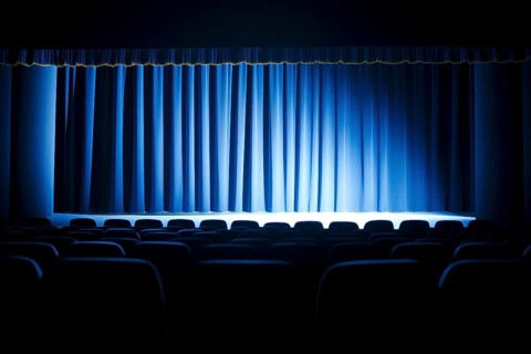 Cinema hall with curtain in front of the screen