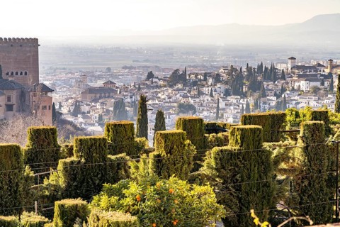 View from the Generalife of the Alhambra castle complex and the city of Granada