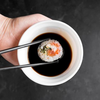 Bowl with sauce sushi
