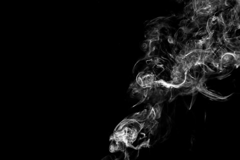 White fume black background