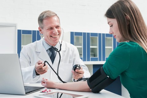 Doctor tending patient
