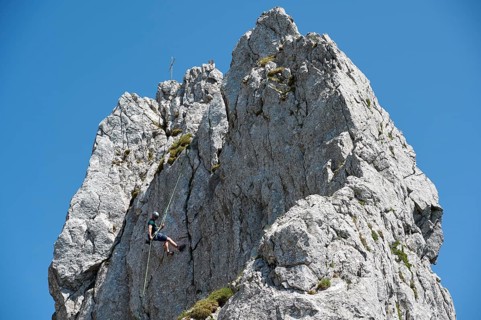 Climber abseiling on the Rossstein Needle