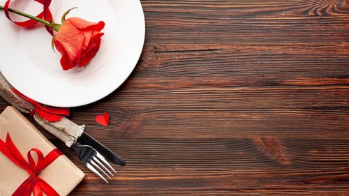 Lovely arrangement valentines day dinner wooden background with copy space