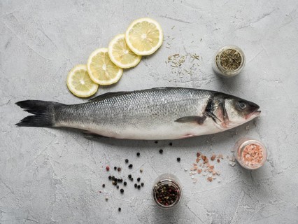Flat lay fish lemon spices