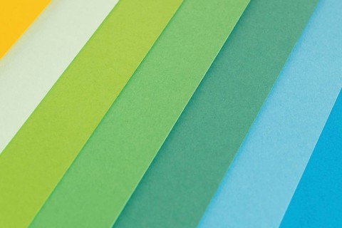 Layers gradient green colored papers