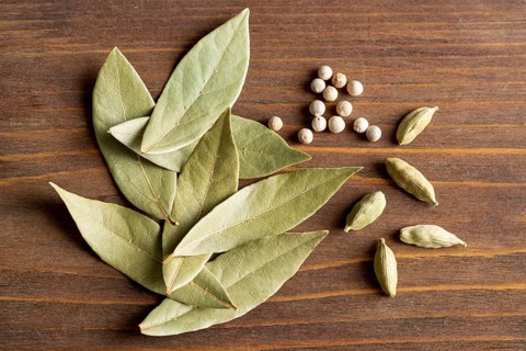 Top view bay leaves with pepper