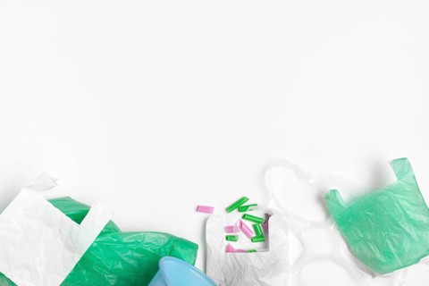 Top view plastic bags with copy space