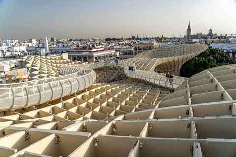 The futuristic wooden construction and observation deck Metropol Parasol and the rooftops of Seville