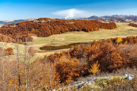 Mountain landscape and the lake Poscensko Jezero in autumn
