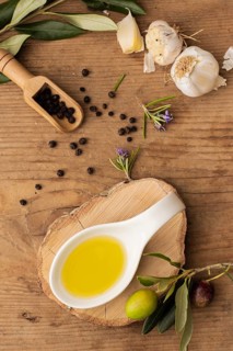 Flat lay olive oil garlic pepper