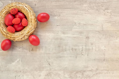 Red painted eggs easter basket