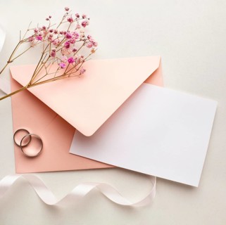 Pink flowers envelope save date wedding concept