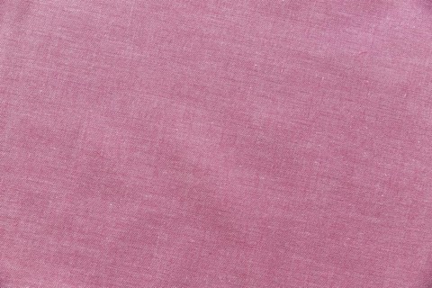 Elevated view pink textile background