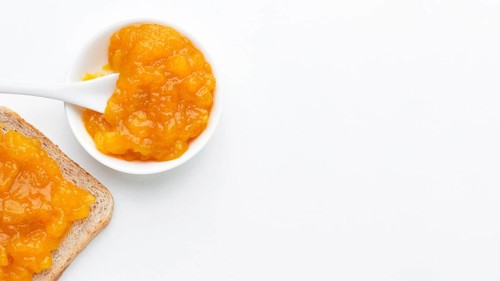 Flat lay apricots jam bread