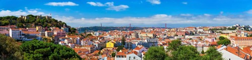 Lisbon famous panorama from Miradouro dos Barros tourist viewpoint over Alfama old district with St George's Castle