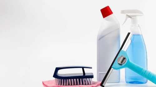 Arrangement with cleaning products white background
