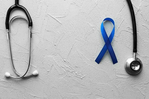 Black stethoscope blue ribbon plaster