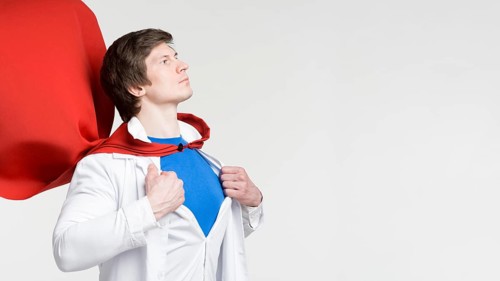 Man with red cape lab coat
