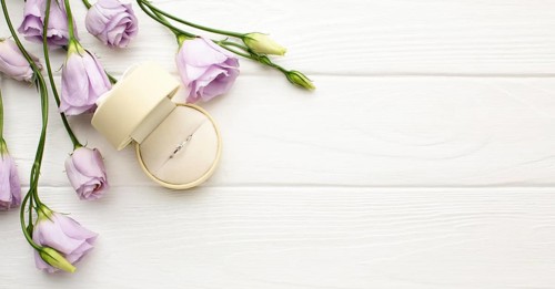 Wedding ring flowers copy space