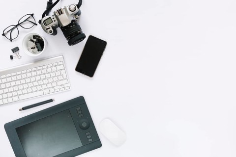 Digital camera graphic digital tablet keyboard mouse cellphone white background