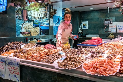 Saleswoman at the seafood stall