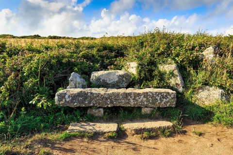 Stone bench by the wayside